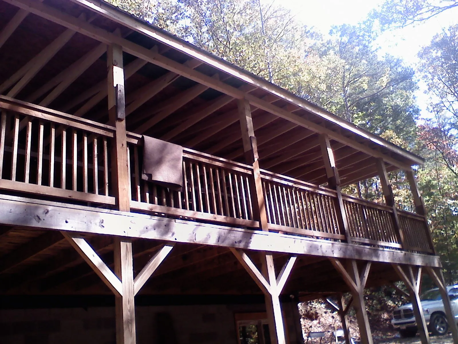 Timber framing under a new elevated porch and deck — Roof Leak Repair in Block Island by Roofing Brothers